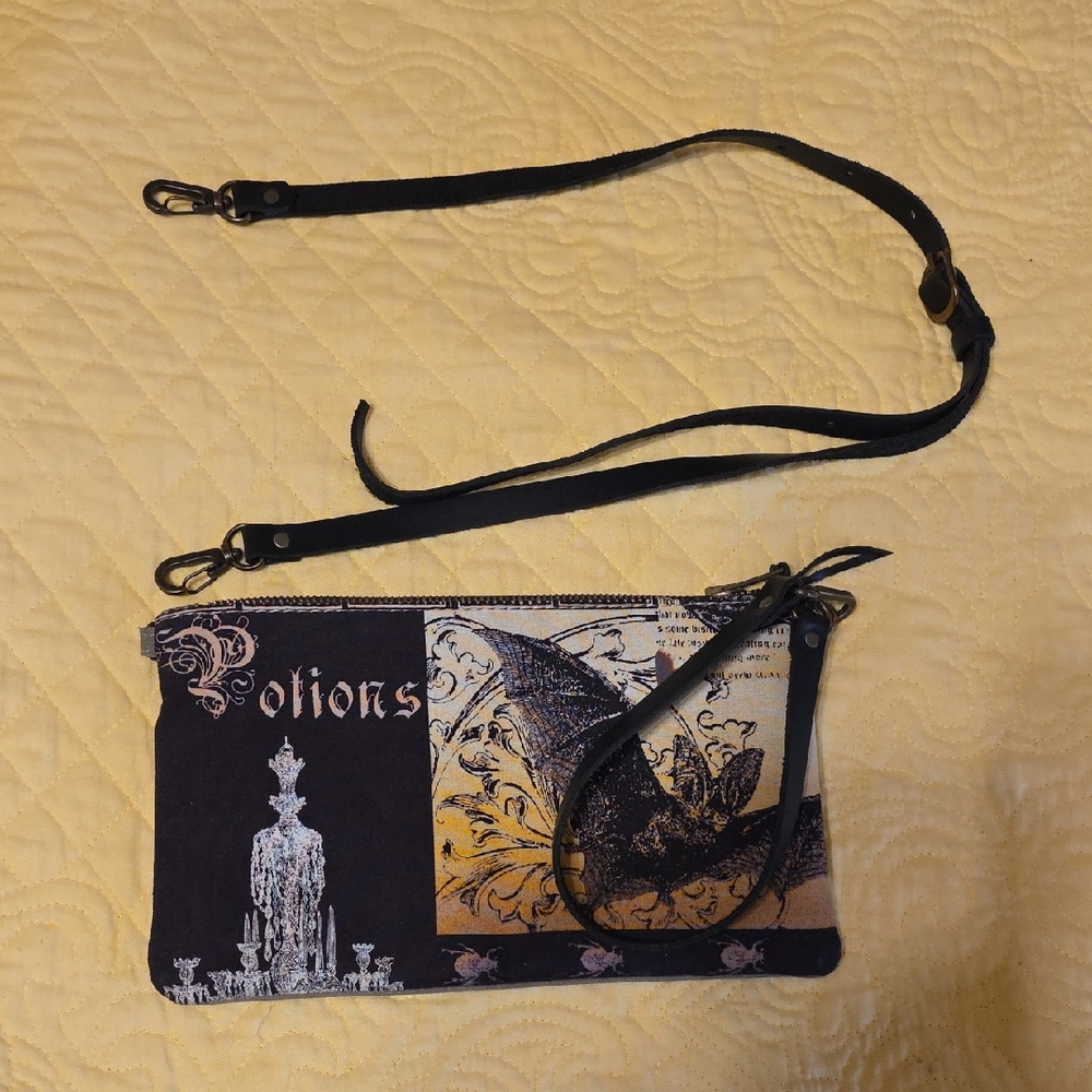 Elegant Black and Gold Clutch with Strap